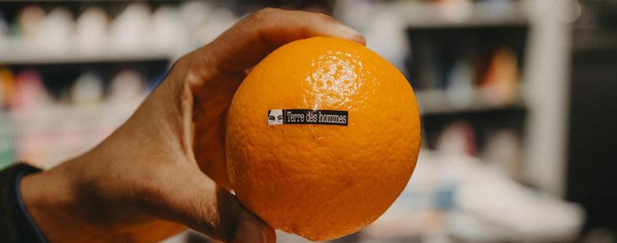 Traditionnelle vente d'oranges de Terre des hommes